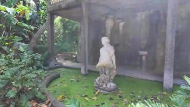 POV Lisbon green park walkway sunny day Europe city travel destination with architecture background