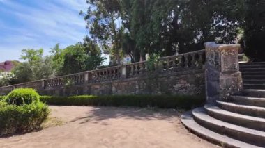 Walking Lisbon park green trees sunshine Europe city architecture historic travel background