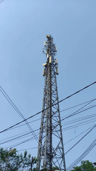Single Base Transceiver Station (BTS) tower. The steel frame tower houses electronic communications equipment. Electronic infrastructure