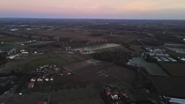 Aerial View Captures Countryside Lake Village Sunset — Stock Video