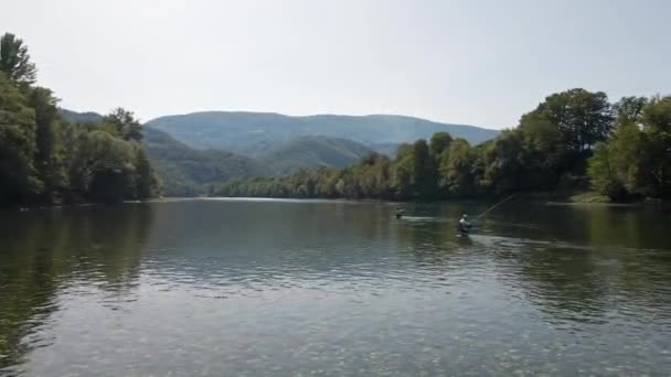 Drone Flies Captures Fishermen Waist Deep River Valley Mountain — Stock Video