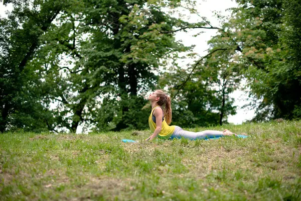 stock image Yoga exercise in nature