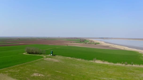 Aerial Video Green Fields Surrounding Lake Nature Reserve Slano Kopovo — Stock Video