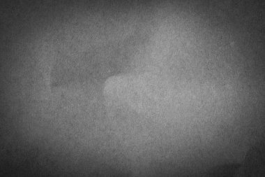 Düşük ışık arkaplanındaki siyah buruşmuş kağıt dokusu