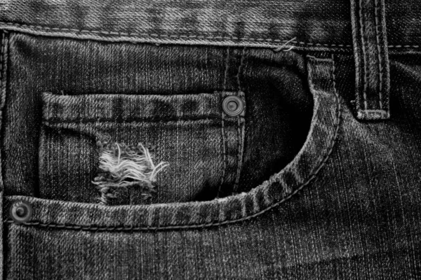 Denim kot kumaşı. Tasarım için Denim arkaplan dokusu. Kumaş kumaş. Arka plan olarak kullanılabilen mavi kot. Herhangi bir arkaplan için mavi kot dokusu.