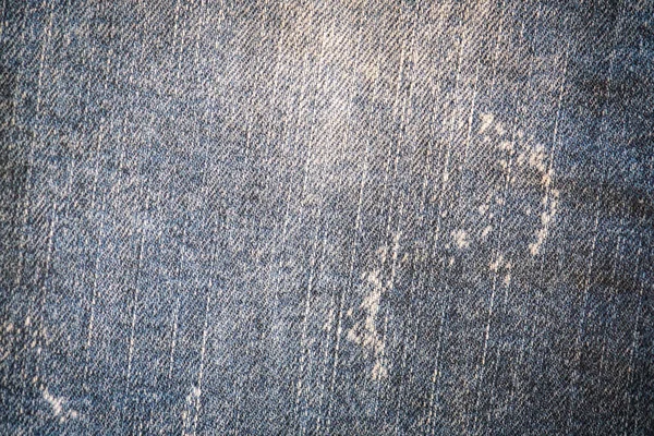 Denim kot kumaşı. Tasarım için Denim arkaplan dokusu. Kumaş kumaş. Arka plan olarak kullanılabilen mavi kot. Herhangi bir arkaplan için mavi kot dokusu.