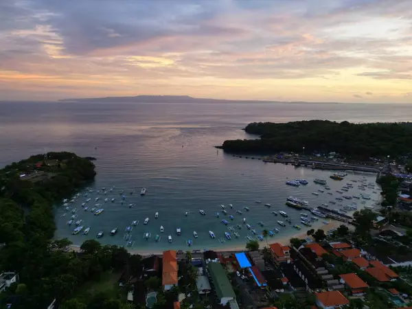 stock image Stunning Aerial Evening View of Padang Bai Harbor in Bali Indonesia while Sunset looking from shore to the ocean. High quality photo