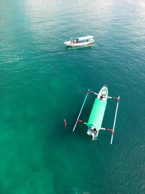 Two Jukung Traditional Asian Fisherboat or also diving. Top down aerial View. High quality photo clipart