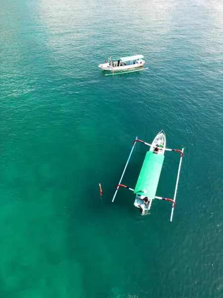 stock image Two Jukung Traditional Asian Fisherboat or also diving. Top down aerial View. High quality photo