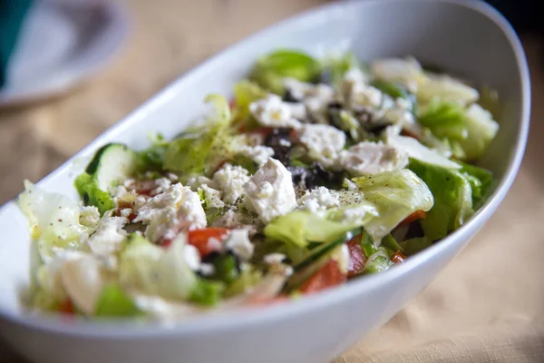 stock image Greek salad shot very close topped off with feta