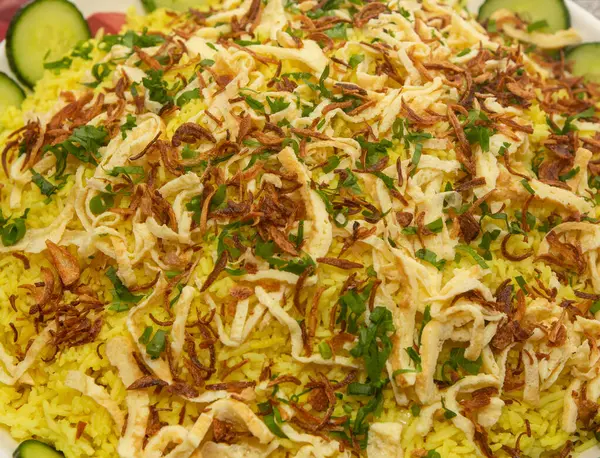 Malezyalı Nasi Kuning ayrıca kutlama pirinci olarak da bilinir.
