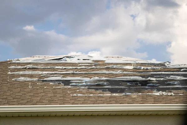 Not fixed Damaged roof from hurricane Ian