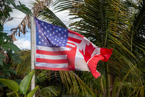 United States and Canada Combined flag in the wind