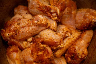 Seasoned Raw Chicken wings to be air fried clipart