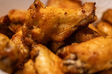 Close up shot of chicken wings with no sauce clipart