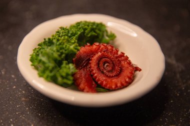 A serving of Coiled Octopus Sashimi clipart