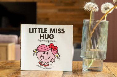 Devon UK. 10-30-24. Little Miss Hug, child's book by Roger Hargreaves. From the MR men series. clipart