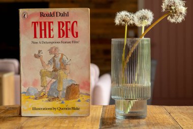 Devon UK. 10-30-24.  The BFG, by Roald Dahl. The big friendly giant. Classic book in sharp focus set against a softly focused living room background. Classic novel.  clipart