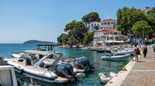 stock image Skiathos, Greece. 06-24-24. Skiathos town panorama picture looking towards Plakes. Boats fill the foreground Part of the Sporades islands, Greece. Holiday and vacation picture.