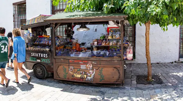 stock image Skiathos, Greece. 06-29-24. A herbs and spices van in Papadiamanti street on the island of Skiathos. Showing the vibrant colours and tourists.