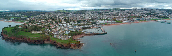 Paignton seafront and harbour aerial panorama including Roundham head. Colourful and vibrant image. Torbay and English Riviera