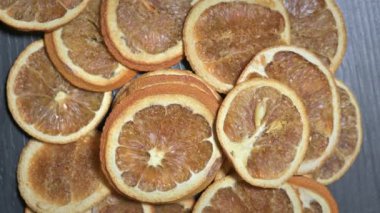 Dried Orange Slices On A Black Background