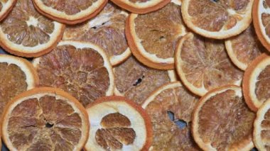Dried Orange Slices On A Black Background