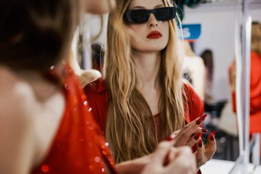 KYIV, UKRAINE - FEBRUARY 04, 2022: Models Backstage GASANOVA show - Ukrainian Fashion Week Fall Winter 2022-2023