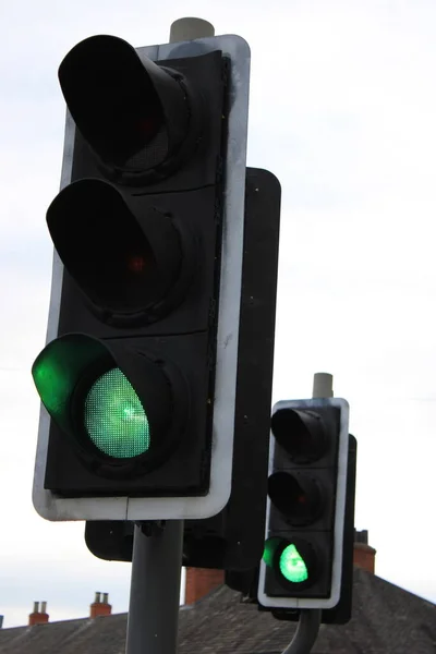 Traffic lights on green taken at a pedestrian crossing
