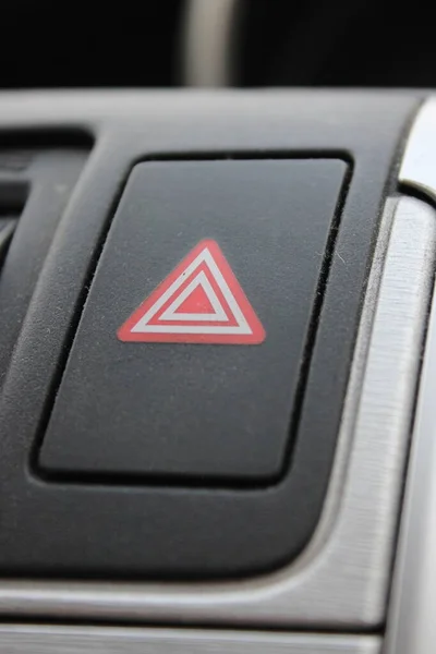 Car Hazard lights button used to alert motorists of a hazard