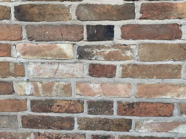 Close up picture of a textured brick wall
