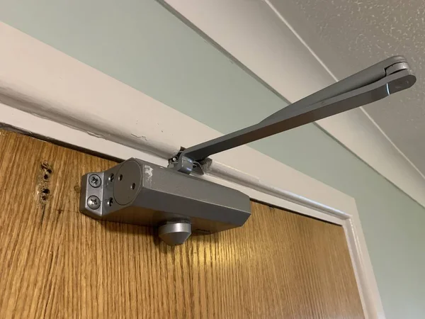Overhead fire door closer, Used for health and safety to prevent fires from spreading quickly