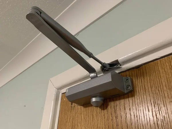 Overhead fire door closer, Used for health and safety to prevent fires from spreading quickly