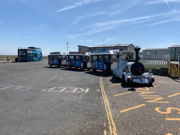 stock image England, Norfolk, Great Yarmouth, May 8th 2024 Great Yarmouth Road Train arriving on North Drive outside Haven Seashore resort