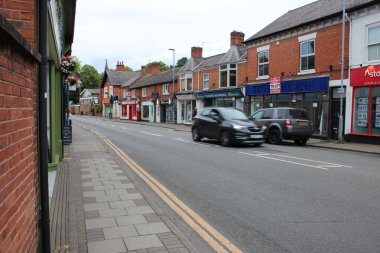 Syston, Leicestershire UK, 5 Temmuz 2024 High Street, Syston bulutlu bir yaz öğleden sonra