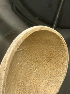 Tahta Mutfak Kaşığının Yakın Çekimi Doğal Doku ve Tahıl Gösterimi