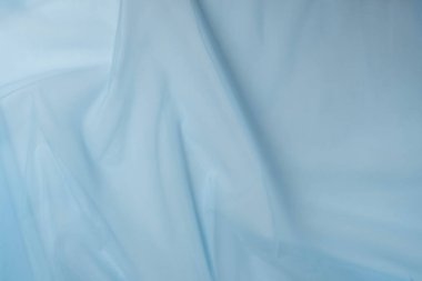 Mavi tül kumaş dokusu üst görünüm. Mavi arkaplan.