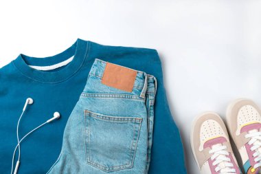 Female clothes and accessories on white background