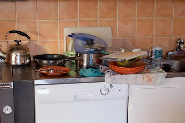 Unwashed dishes in a kitchen in a swedish house