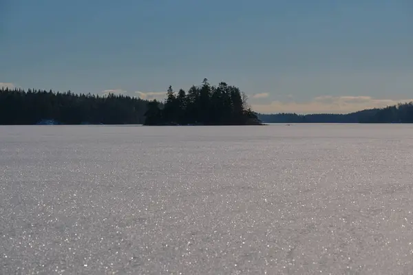 Walk on a frozen lake in a wonderful winter landscape on a sunny day in Skaraborg Sweden