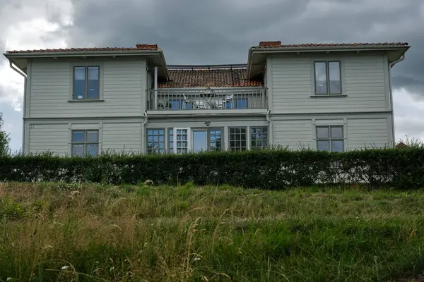 stock image Day trip on a cloudy summer day to the town of Hjo on Lake Vaettern, Sweden's second largest lake