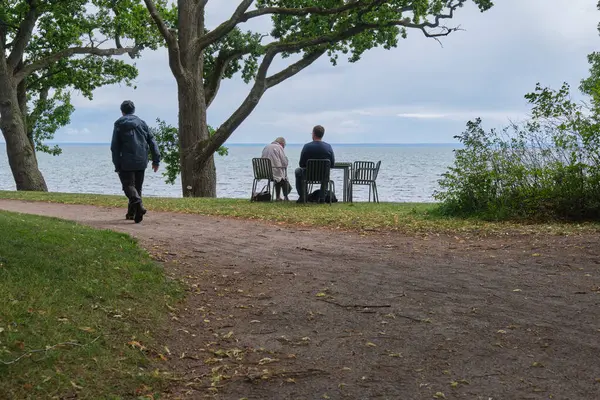 stock image Day trip on a cloudy summer day to the town of Hjo on Lake Vaettern, Sweden's second largest lake