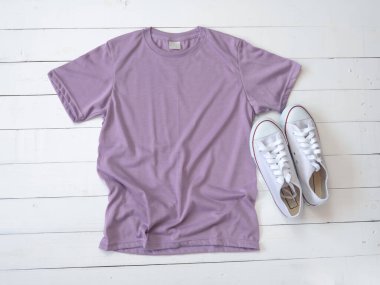 Purple T Shirt mockup weathered and canvas shoes on white wood background shirt template
