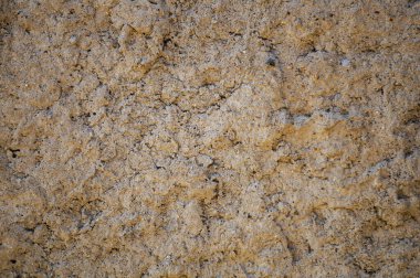 Deniz kıyısındaki yakın çekim üzerinde kayalar dokusu. Doğal taş arka plan