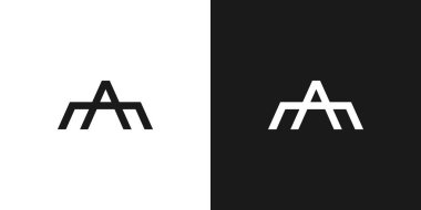 AM logosu benzersiz ve siyah aksanlı modern.