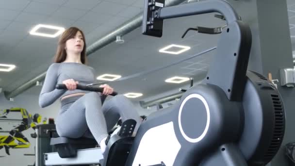Young Woman Doing Exercise Cable Rowing Crossover Machine Gym Healthy — Stock Video