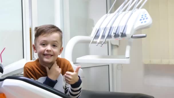 Cute Little Boy Showing Thumb Dentist Office — Stock Video