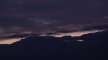 Dark red sunset with beautiful clouds, dramatic timelapse video. 4k video