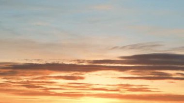 Beautiful sky at sunset time lapse, beautiful background. Blue sky with clouds and sun, clouds at sunrise. 4k video