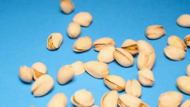 Roasted Pistachios Falling Blue Background Healthy Nutrition Nuts Background Food — Stock Video